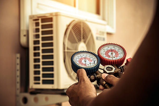 Professional Air Conditioning Service technician working in Sharon, WI